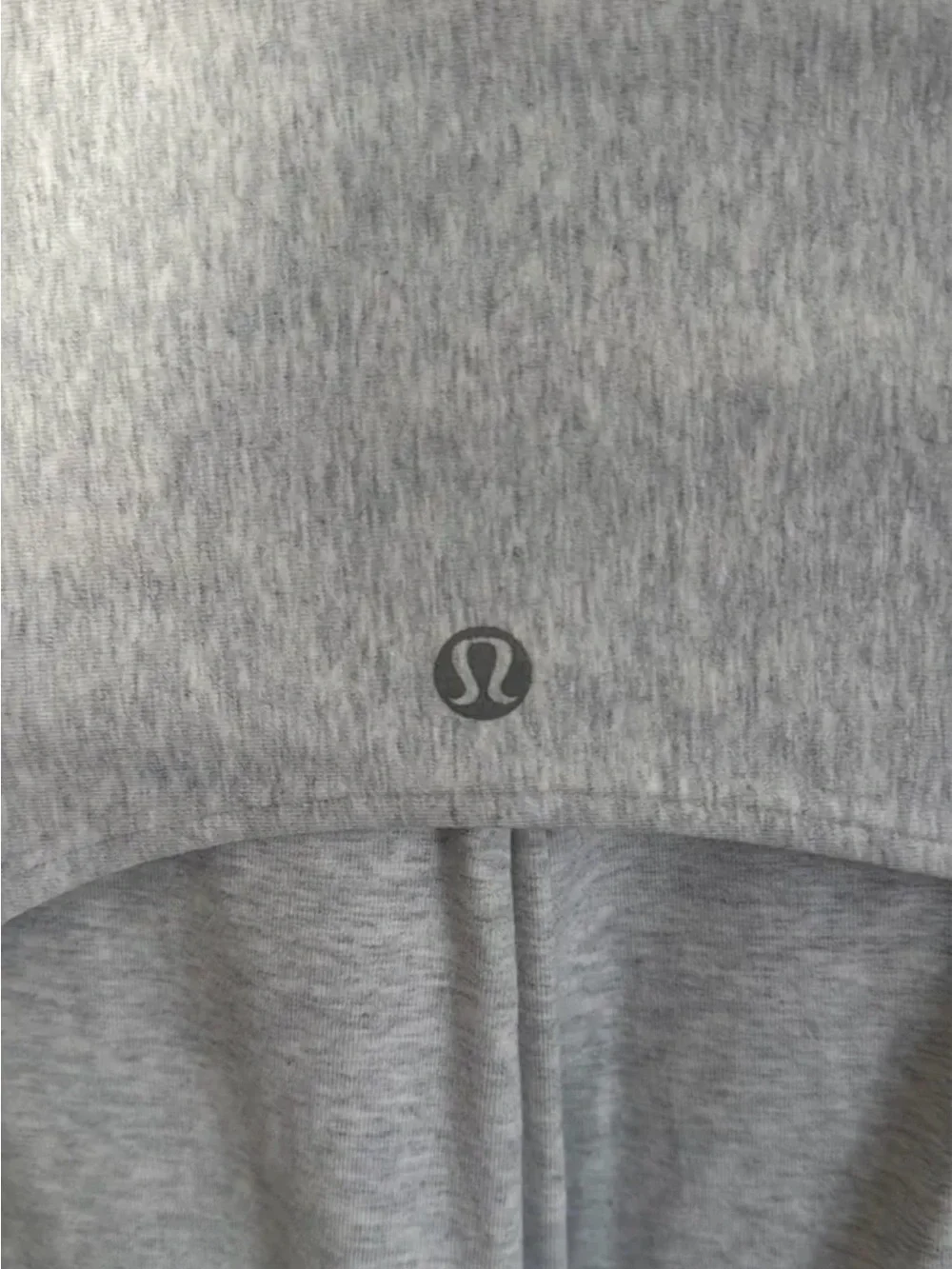 Lululemon Sway Moto Jacket in light gray and white.